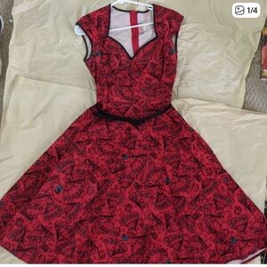Pinup girl Spanish fan dress fit and flare with belt. Never worn
